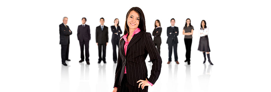 Attractive young successful professional businesswoman at the forefront of a line-up of business people.